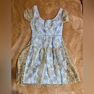Women blue gold dress